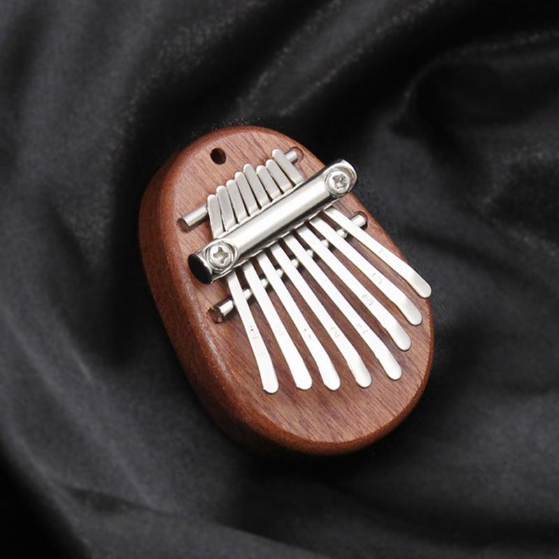 Cute Shaped Mini 8-tone Thumb Piano, 1 Count Musical Instrument for Children & Adults